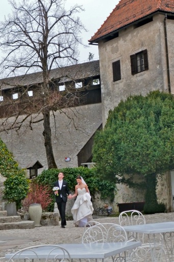 Wedding party in the old castle on the rocks above Lake Bled.